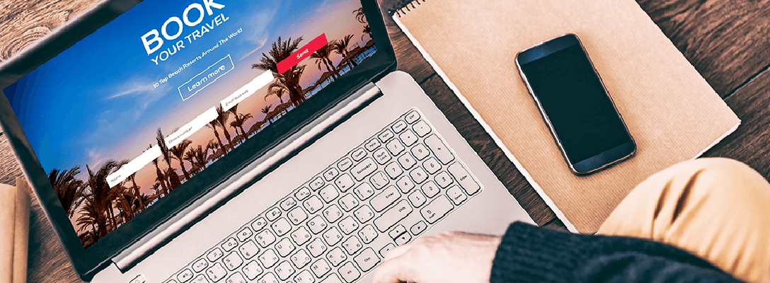 Person Using Laptop to Book Cheap Vegas Trip