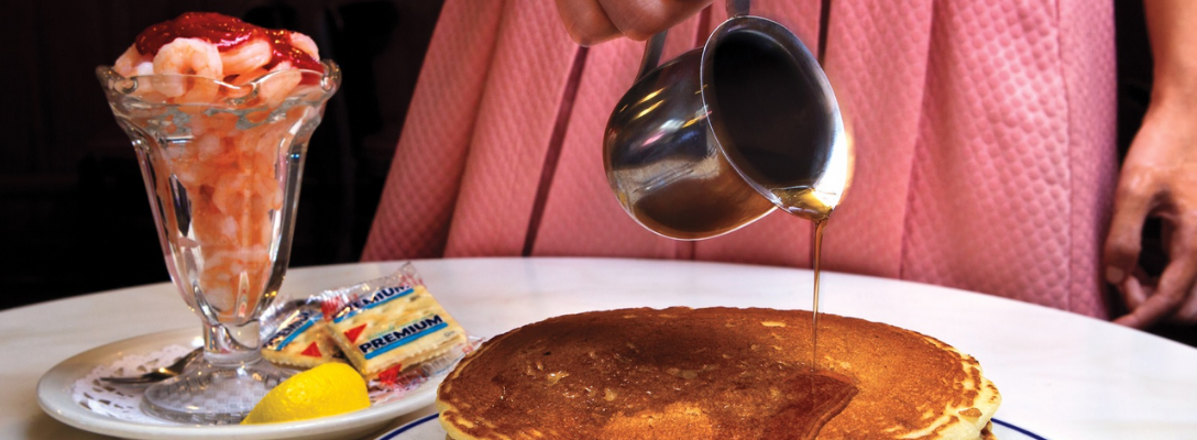 Woman with Pancakes and Golden Gate Casino Shrimp Cocktail